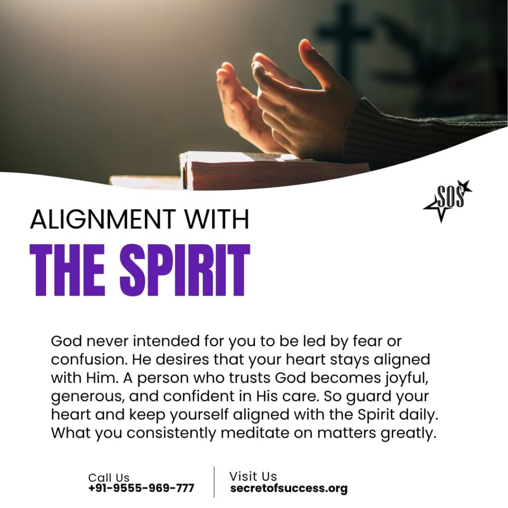 Person praying with Bible symbolizing alignment with the Holy Spirit and spiritual growth